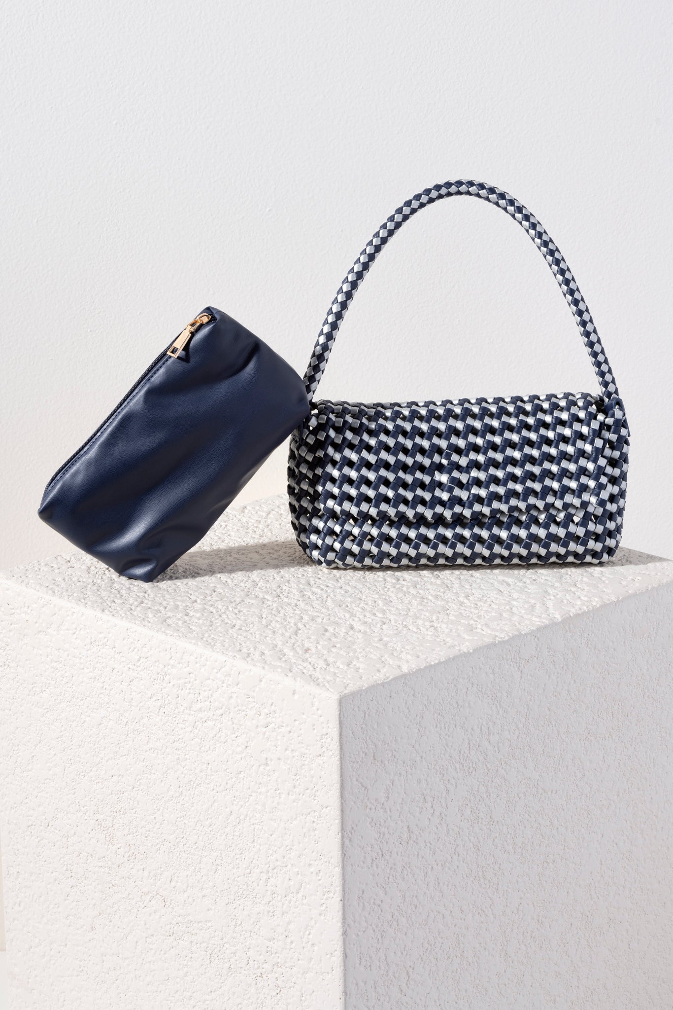 Add a pop of color to your summer wardrobe with Shiraleah's Monroe Shoulder Bag. Made from intricately handwoven PU, this multicolored purse is the perfect addition to any summer outfit. Its chic baguette style and single shoulder strap allow your to carry it easily from the beach to the restaurant. Pair with other items from Shiraleah to complete your look!