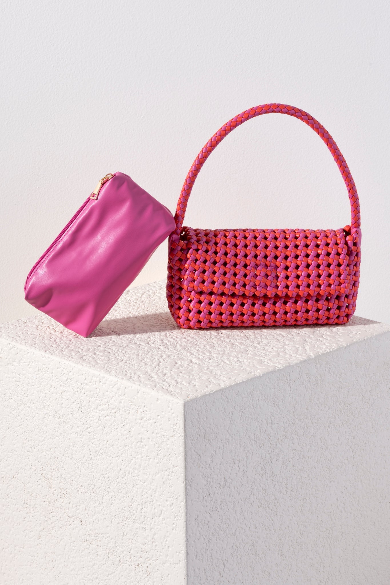Add a pop of color to your summer wardrobe with Shiraleah's Monroe Shoulder Bag. Made from intricately handwoven PU, this multicolored purse is the perfect addition to any summer outfit. Its chic baguette style and single shoulder strap allow your to carry it easily from the beach to the restaurant. Pair with other items from Shiraleah to complete your look!