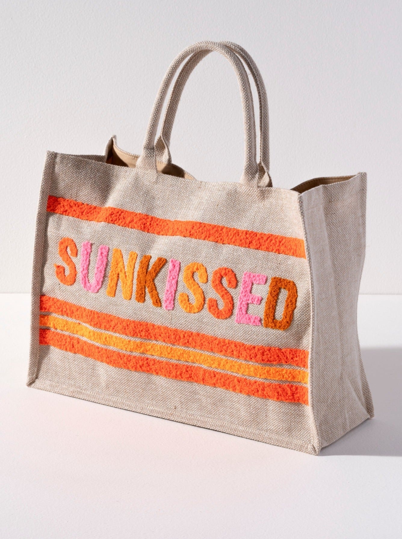 Carry all of your summer essentials for a weekend away in Shiraleah's "Weekend" Beach Bag. Made of durable jute fabric and roomy enough to fit a towel and then some, look no further for your favorite warm weather bag. The trendy toothbrush embroidery adds a pop of color and adds intention to this versatile tote. Pair with other items from Shiraleah to complete your look!