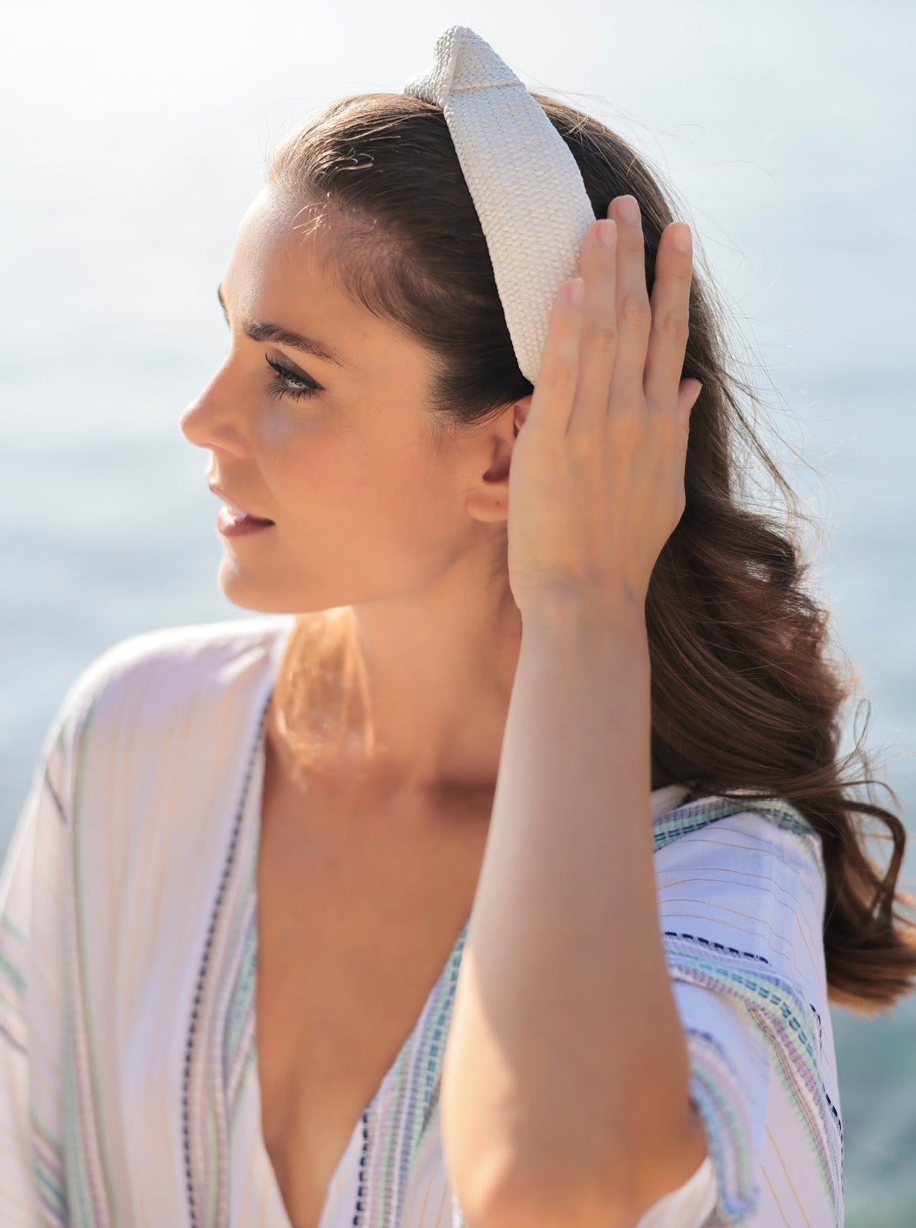 Add an elevated touch to your summer hairstyles with Shiraleah's Knotted Woven Headband. With its bright colored fabric and top knot detail, this chic and feminine headband will be your new favorite summer accessory. Pair with other items from Shiraleah to complete your look!